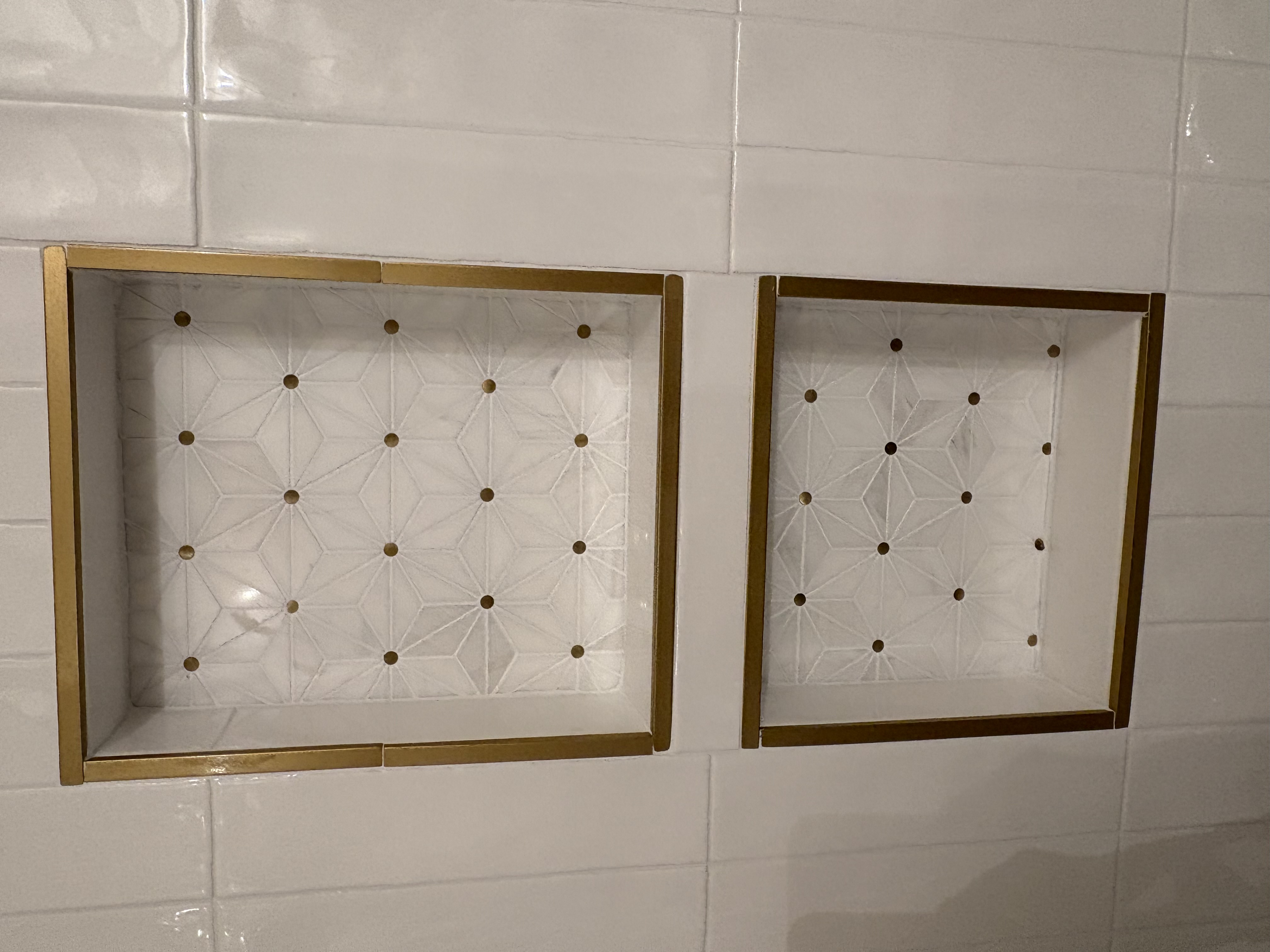 Geometric mosaic tile niches with brass edging, Largo FL